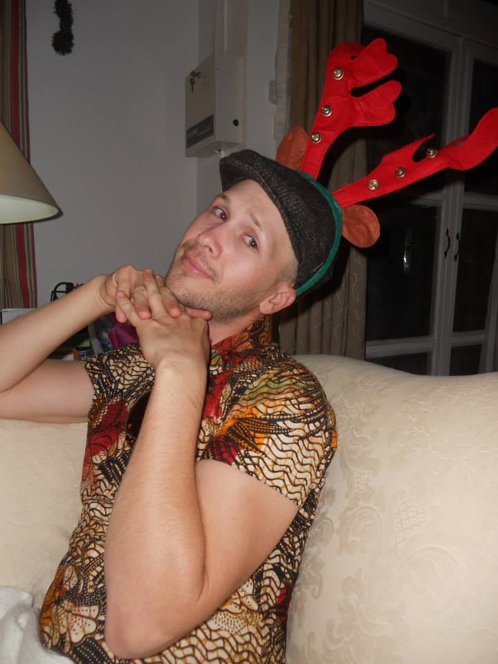 Me wearing an reindeer antlered headband while celebrating Christmas in Burkina Faso, as a Peace Corps Volunteer